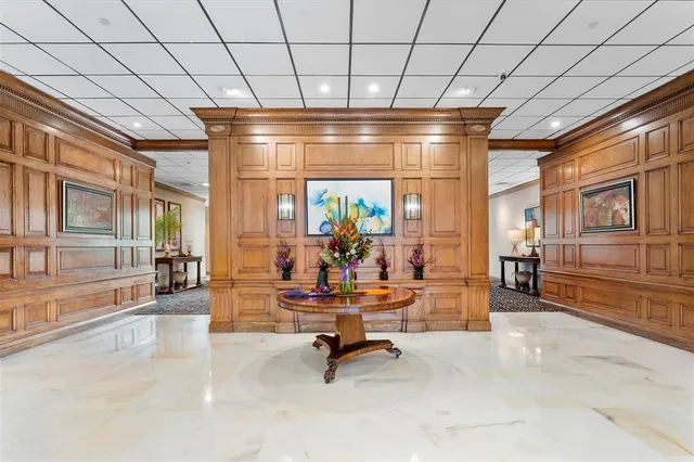 a view of a swimming pool and an outdoor seating