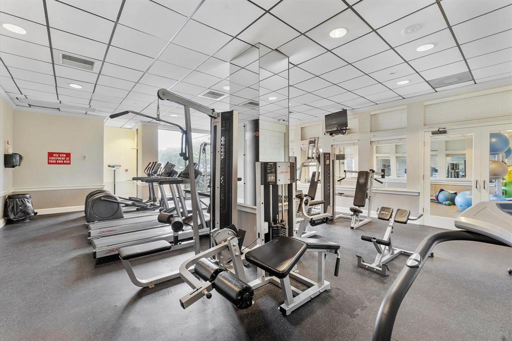 1900 South Ocean Boulevard, Unit 10J Pompano Beach, FL 33062 - Photo 22 of 36 a view of a room with gym equipment