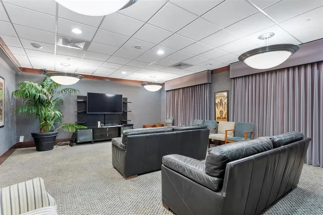 a view of a bedroom with furniture and staircase