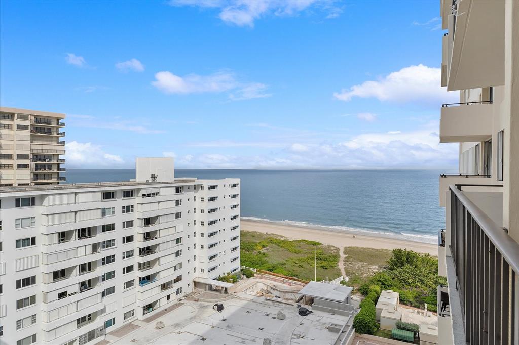1900 South Ocean Boulevard, Unit 10J Pompano Beach, FL 33062 - Photo 8 of 36 a view of a lake with a building in the background