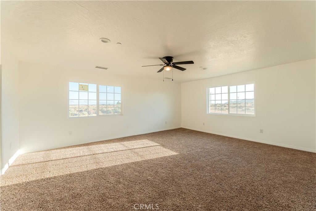 16925 Nanticoke Road Apple Valley, CA 92307 - Photo 50 of 87 a view of an empty room with a window