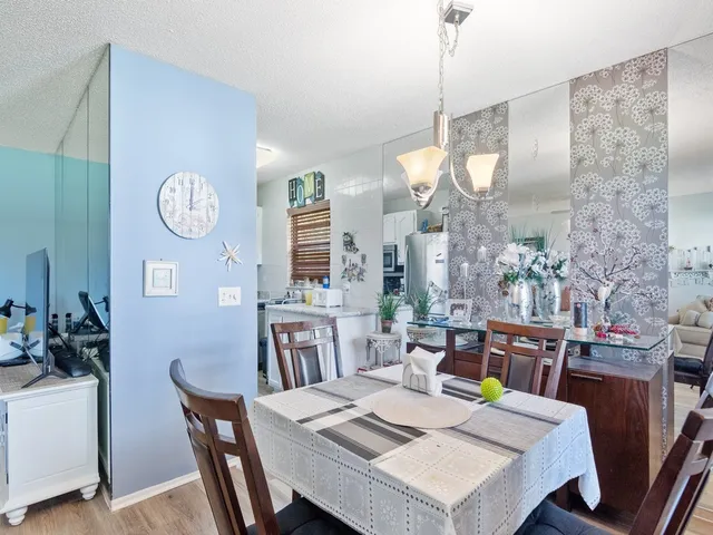a view of a dining room with furniture