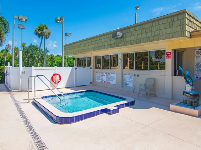 a view of a house with a swimming pool