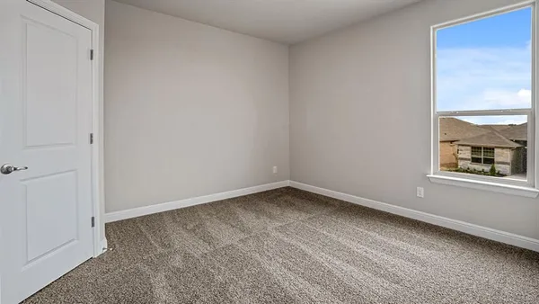 a view of a room that has a window in it