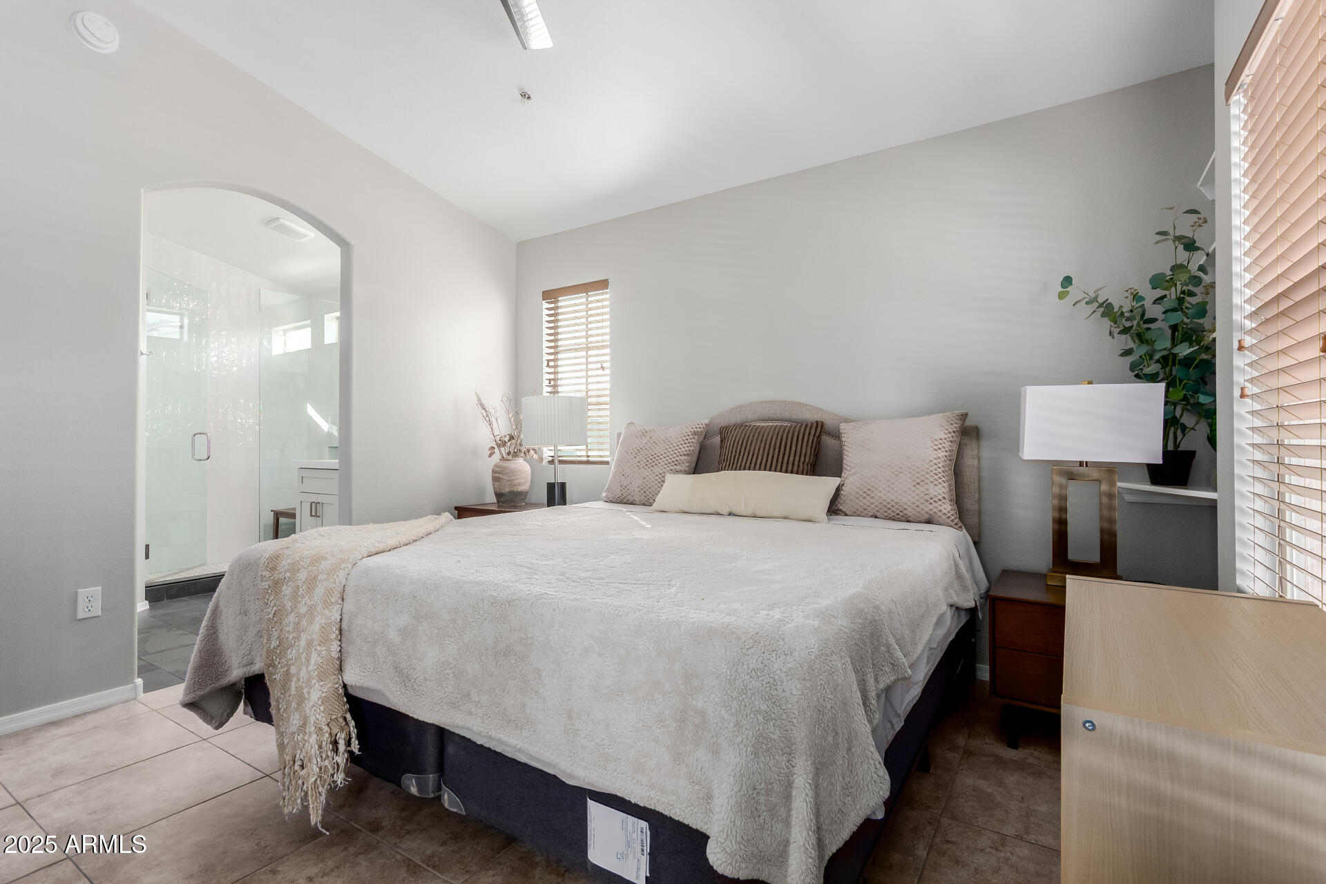 2401 East Rio Salado Parkway, Unit 1106 Tempe, AZ 85288 - Photo 14 of 40 a bedroom with a bed and a night stand