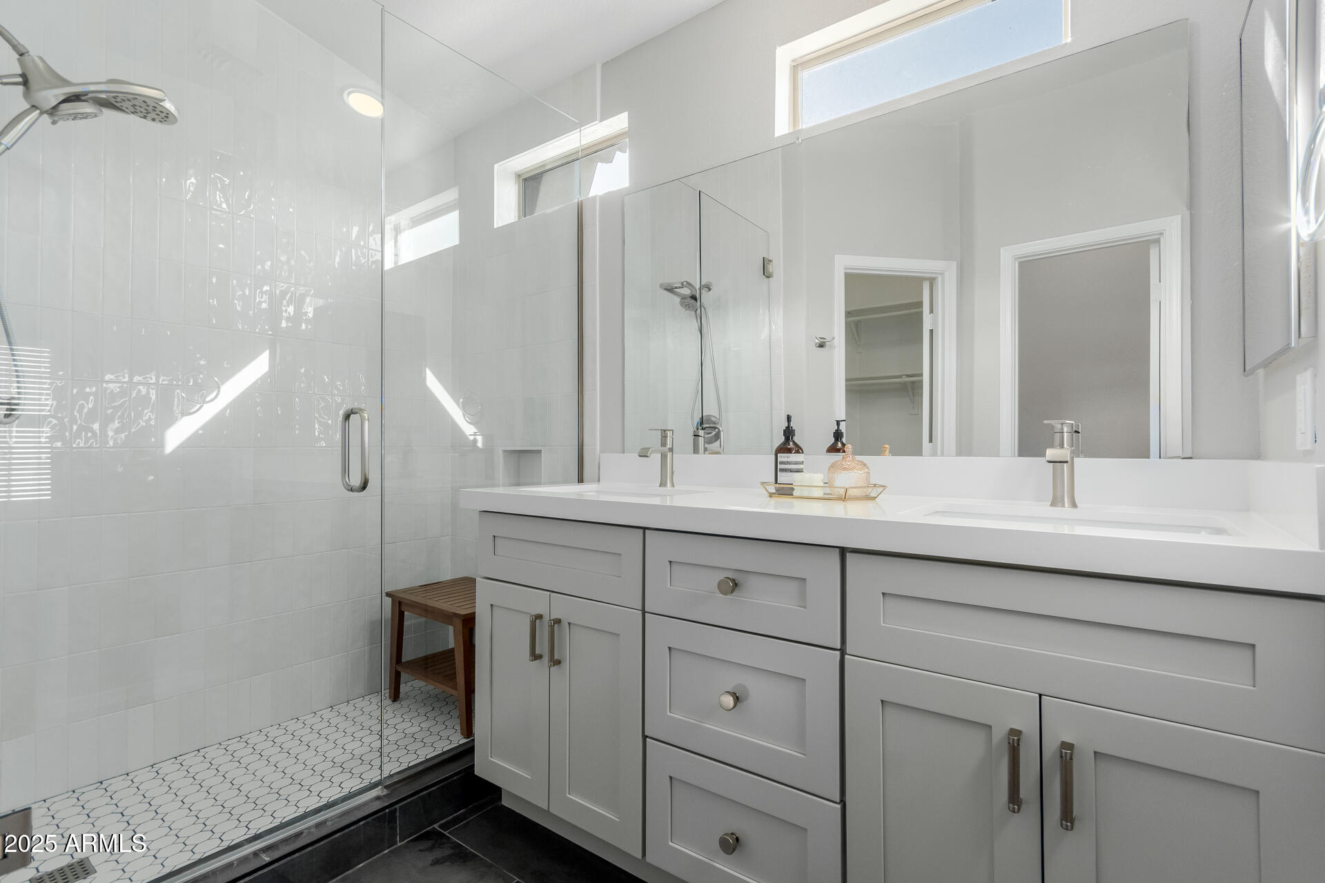 2401 East Rio Salado Parkway, Unit 1106 Tempe, AZ 85288 - Photo 16 of 40 a bathroom with a sink double vanity and a mirror