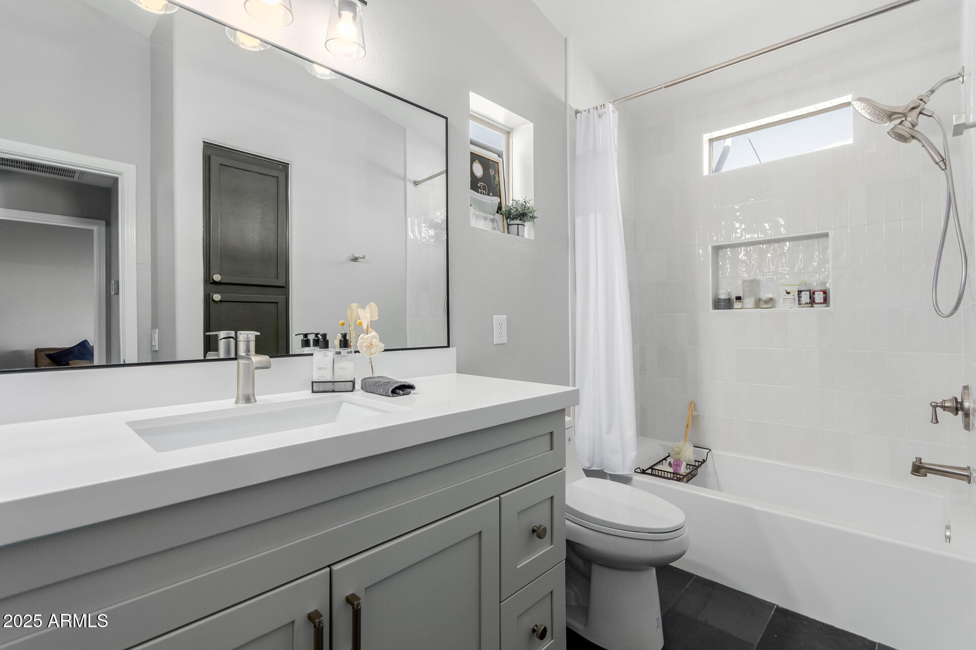 2401 East Rio Salado Parkway, Unit 1106 Tempe, AZ 85288 - Photo 20 of 40 a bathroom with a sink a toilet and shower