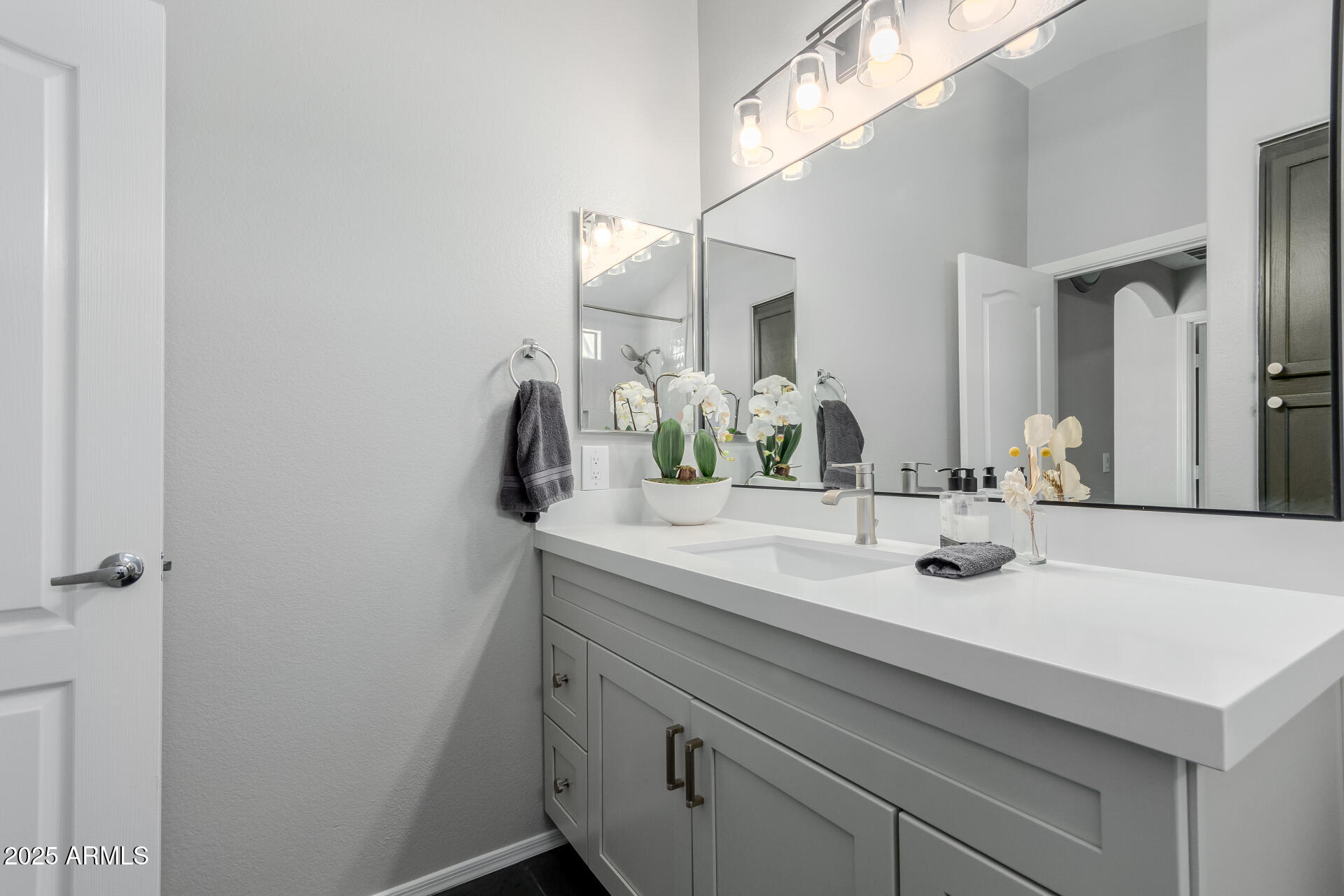 2401 East Rio Salado Parkway, Unit 1106 Tempe, AZ 85288 - Photo 21 of 40 a bathroom with a sink and a mirror