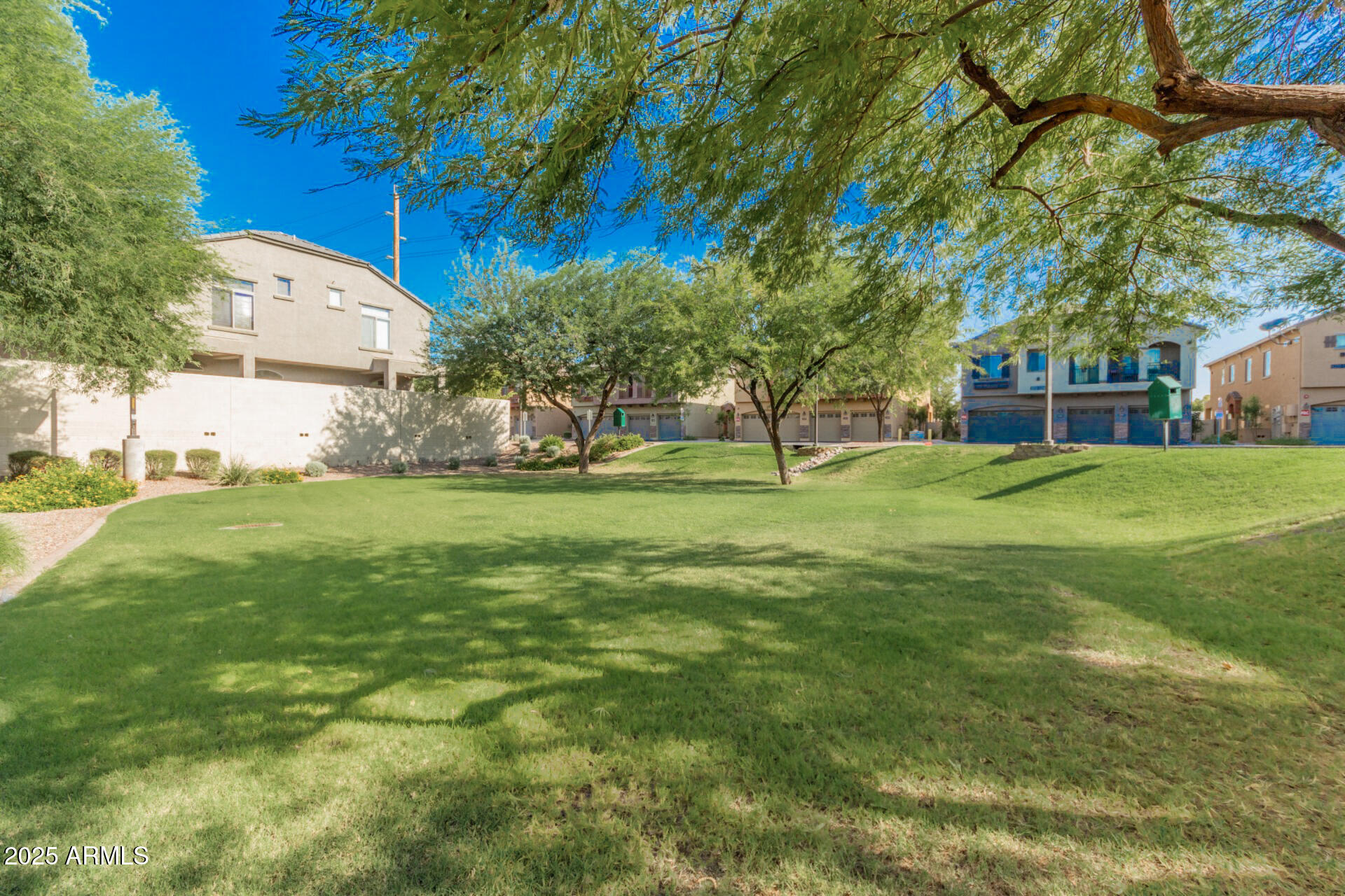 2401 East Rio Salado Parkway, Unit 1106 Tempe, AZ 85288 - Photo 28 of 40 a view of a tree in front of a house