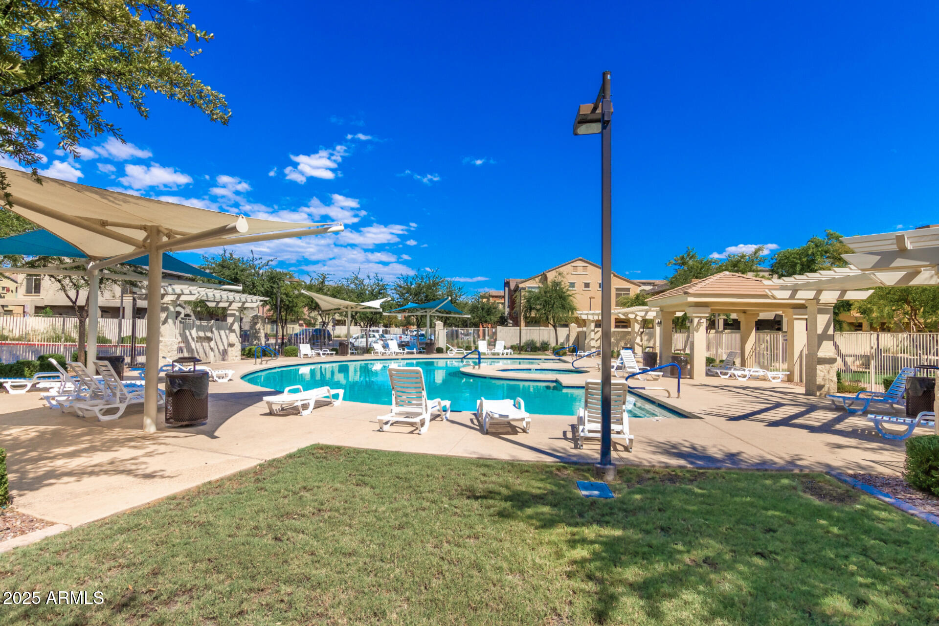 2401 East Rio Salado Parkway, Unit 1106 Tempe, AZ 85288 - Photo 35 of 40 a view of a swimming pool with a patio