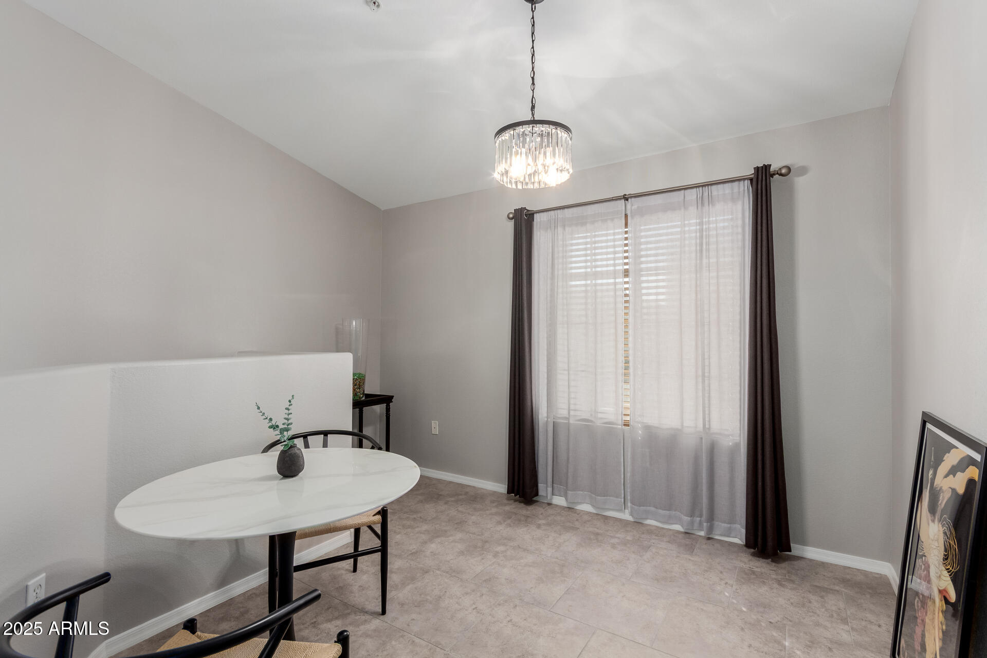 2401 East Rio Salado Parkway, Unit 1106 Tempe, AZ 85288 - Photo 7 of 40 a view of a room with a table and chairs