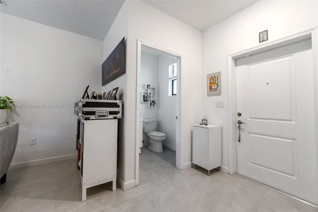 a view of a bathroom with toilet