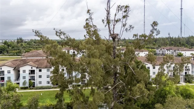 a bedroom with a bed and a desk
