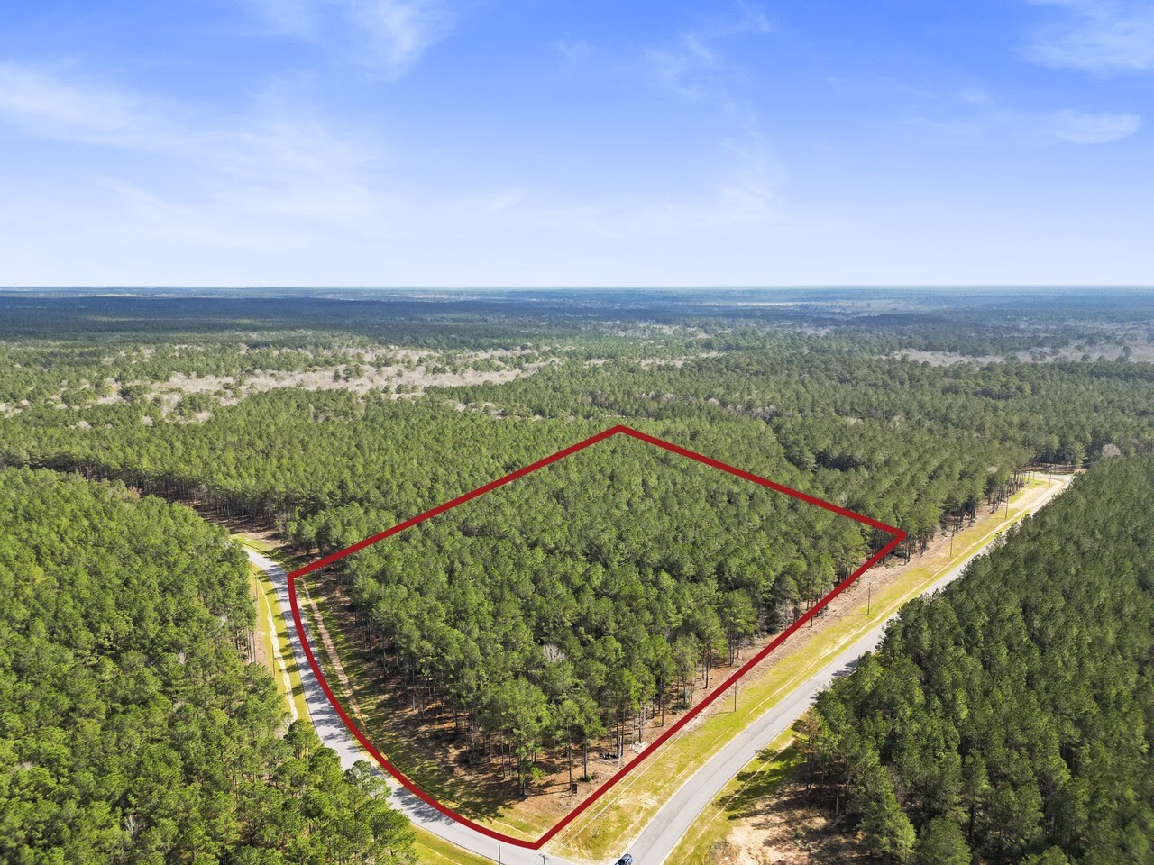 Tbd Queen Anne Way Huntsville, TX 77340 - Photo 1 of 13 a view of a lake from a balcony