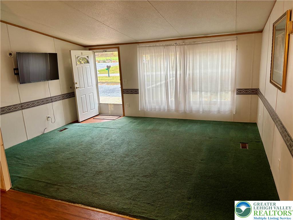 8568 Deer Road Slatington, PA 18080 - Photo 2 of 37 a view of an empty room with a window