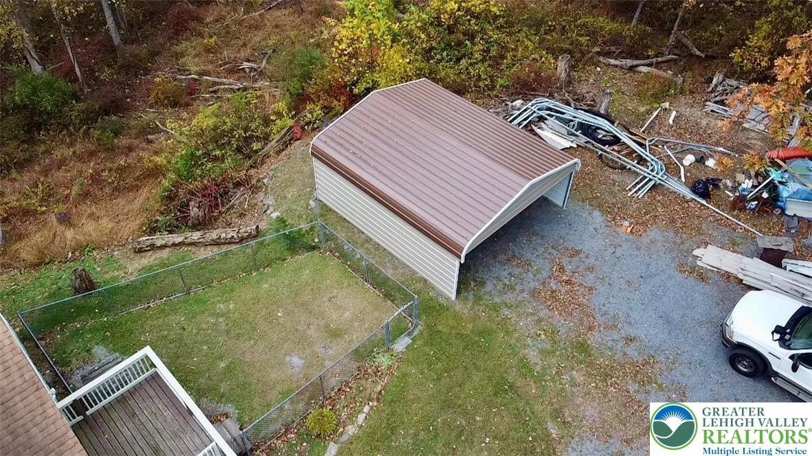 8568 Deer Road Slatington, PA 18080 - Photo 34 of 37 a view of a backyard with plants and a patio