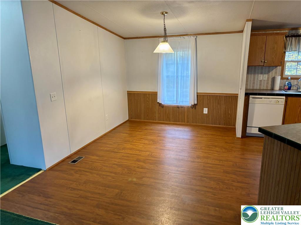 8568 Deer Road Slatington, PA 18080 - Photo 6 of 37 a view of a kitchen with a sink and wooden floor