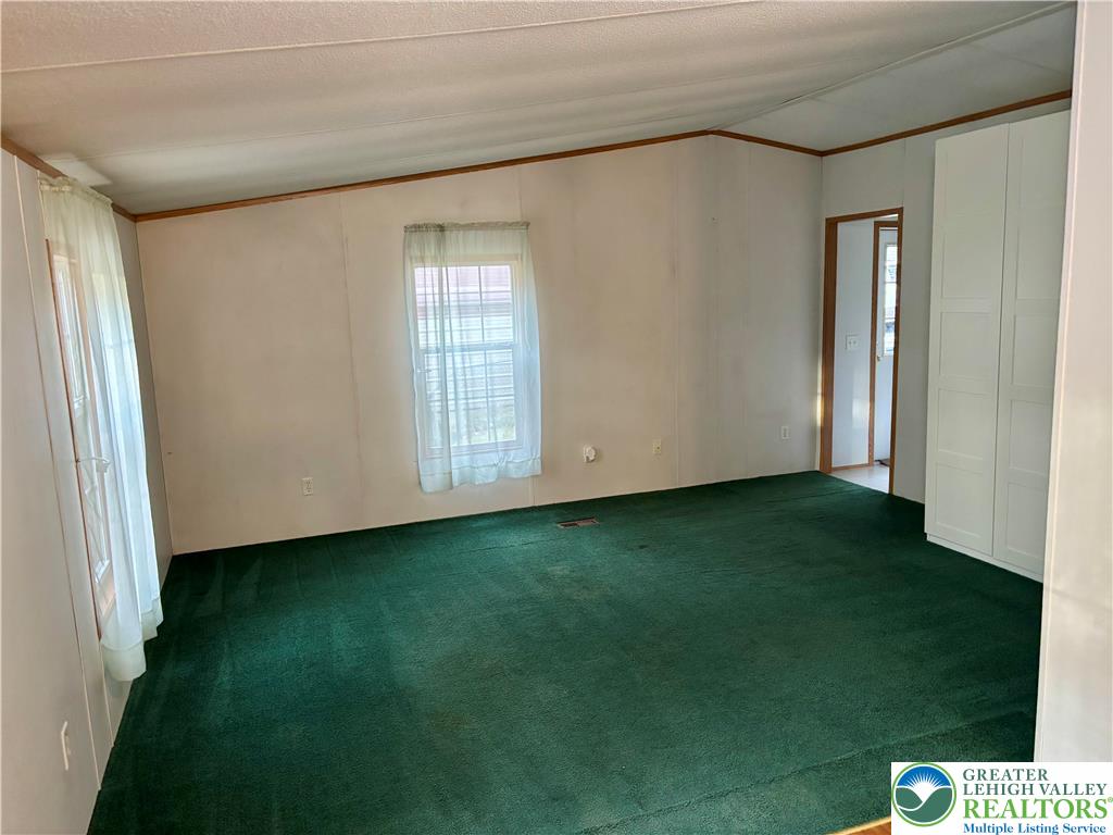 8568 Deer Road Slatington, PA 18080 - Photo 9 of 37 a view of an empty room with a window