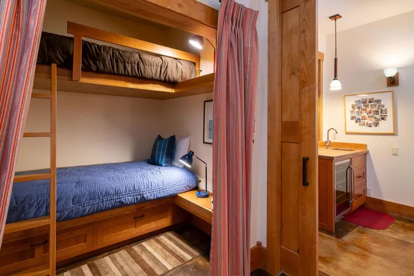 a view of a balcony with wooden floor and stairs