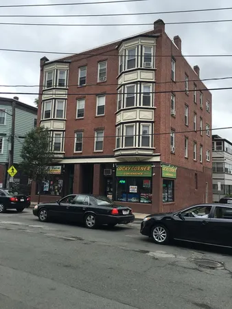 a car parked in front of a building