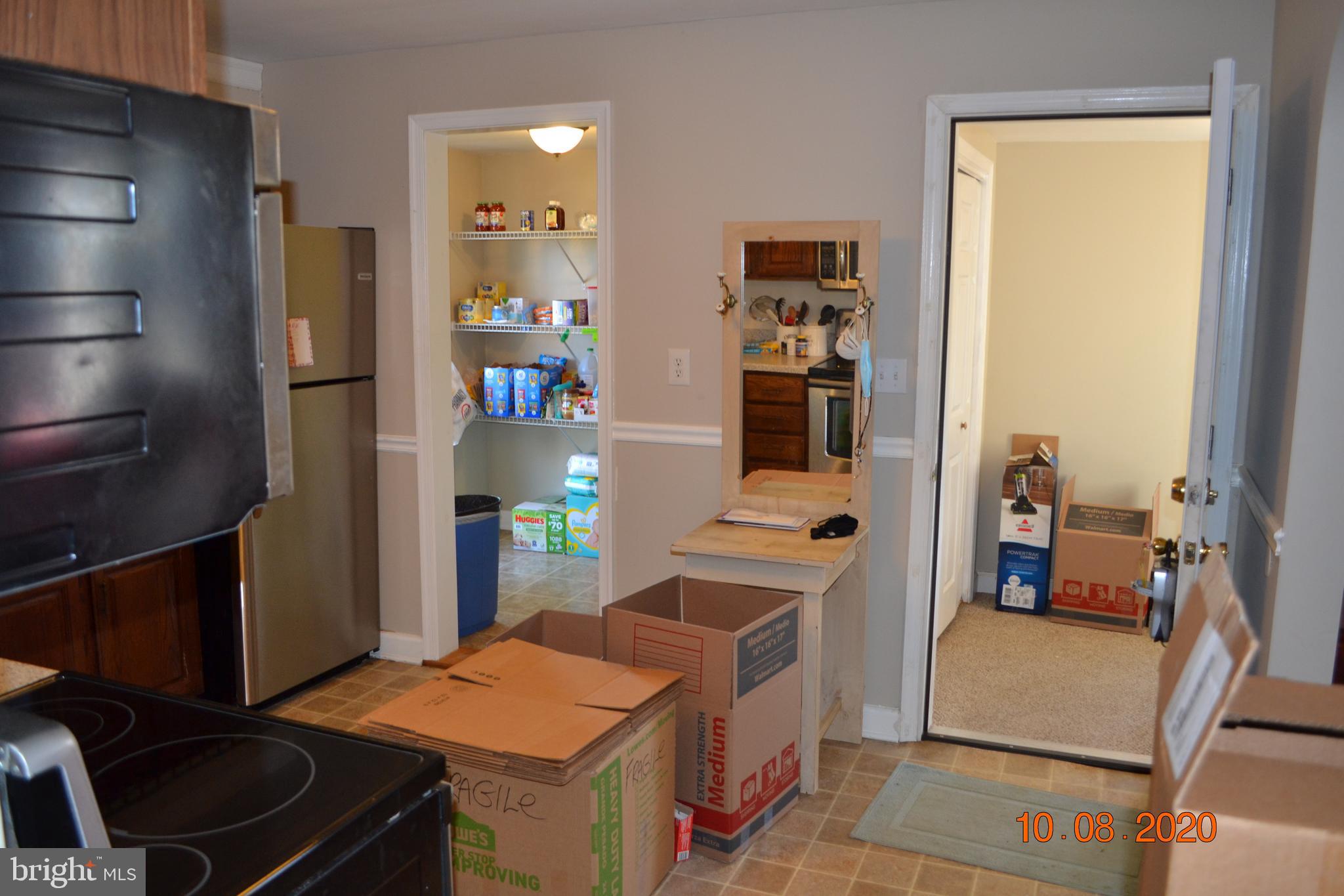 2215 Old Washington Road Westminster, MD 21157 - Photo 14 of 52 Kitchen access to pantry & side enclosed porch