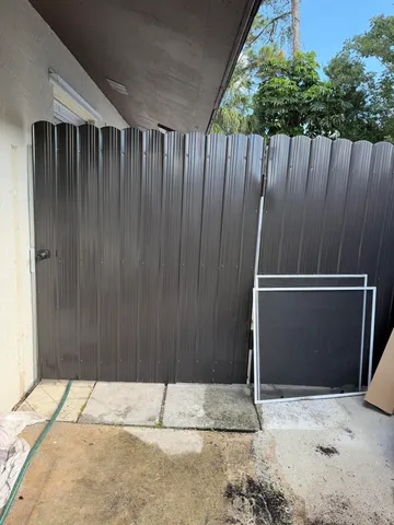 a wooden door in an outdoor space