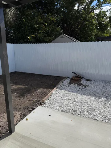 a view of a backyard of a house