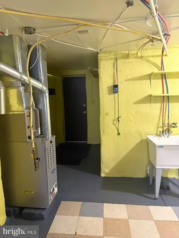 a view of a room with racks on the wall