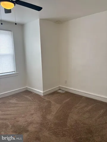 an empty room with window