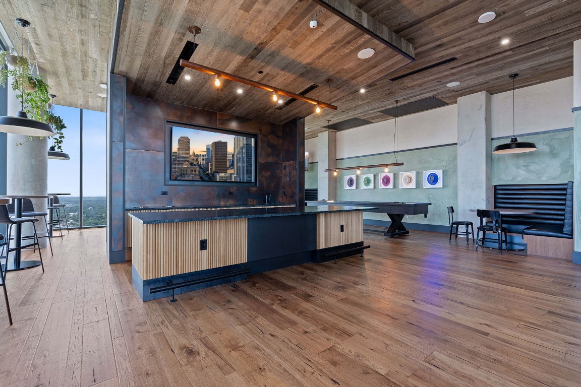 84 East Avenue, Unit 3404 Austin, TX 78701 - Photo 34 of 40 a kitchen with lots of counter top space and a view of living room