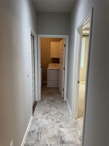 a utility room with a washer and dryer