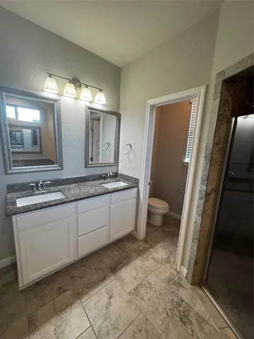 a view of backyard and tree