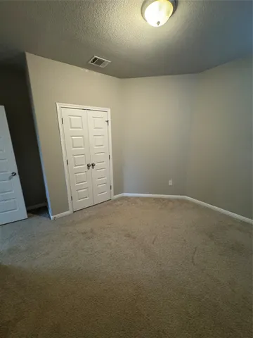 an empty room with closet