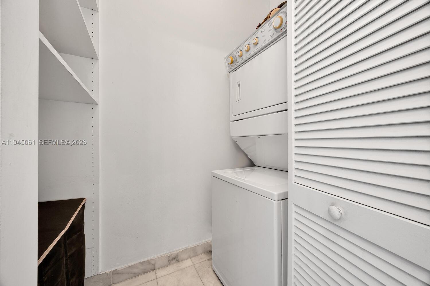 725 Northeast 22nd Street, Unit PH2B Miami, FL 33137 - Photo 21 of 21 a utility room with dryer and washer