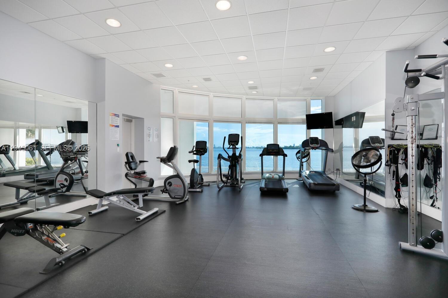 725 Northeast 22nd Street, Unit PH2B Miami, FL 33137 - Photo 7 of 21 a view of a room with gym equipment