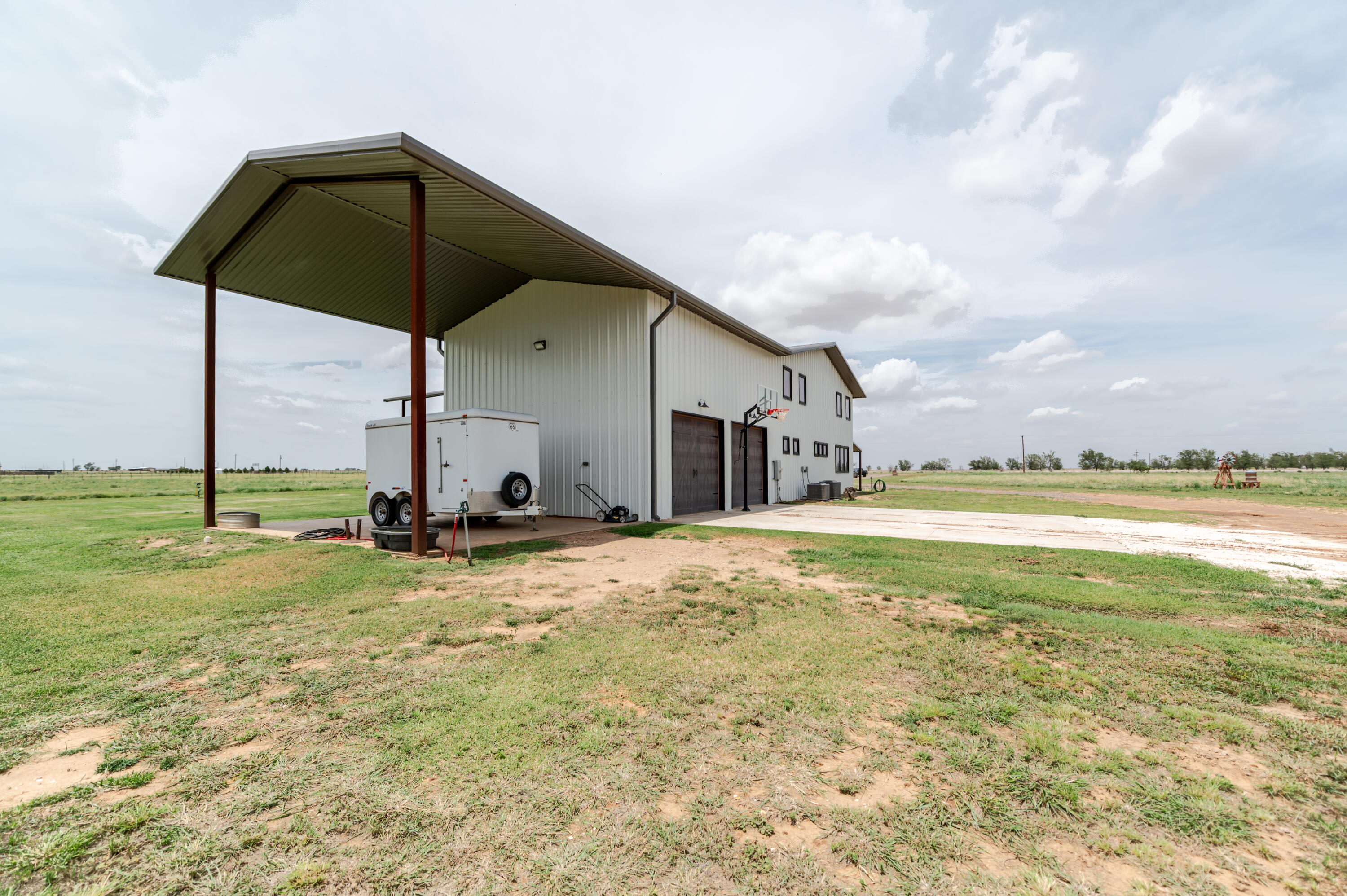 6792 Maine Road Anton, TX 79313 - Photo 58 of 77 a view of a house with a yard