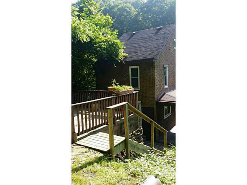 17 Ravine Street Pittsburgh, PA 15215 - Photo 22 of 22 Patio/Deck. Stairs to Concrete Patio in BAck Yard