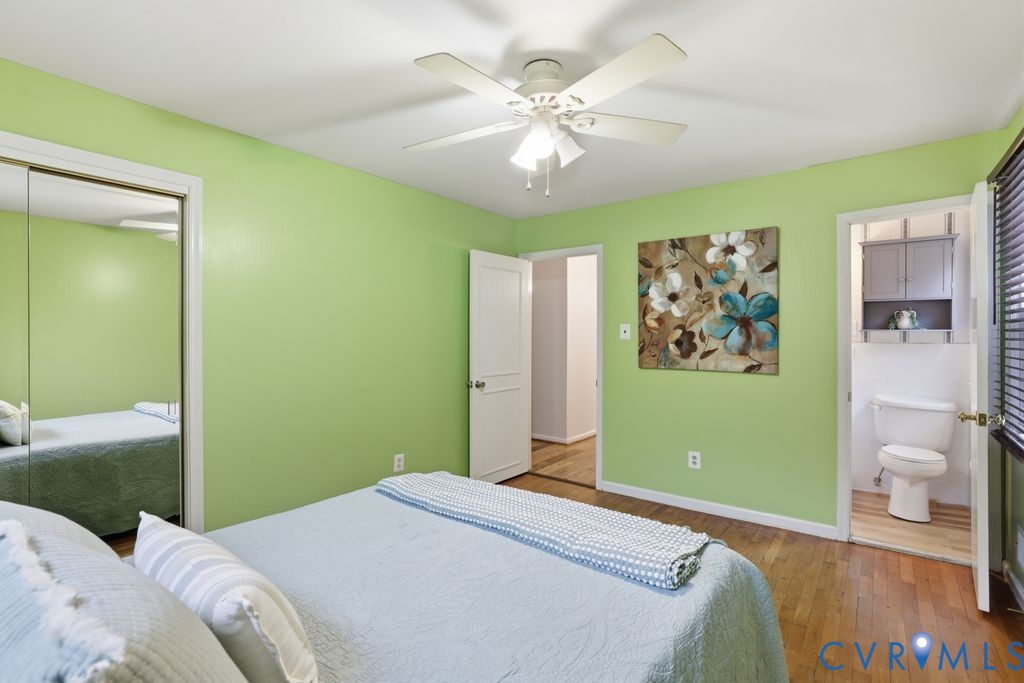 161 Arkwright Road Chesterfield, VA 23236 - Photo 27 of 43 a bedroom with a large bed and a chandelier
