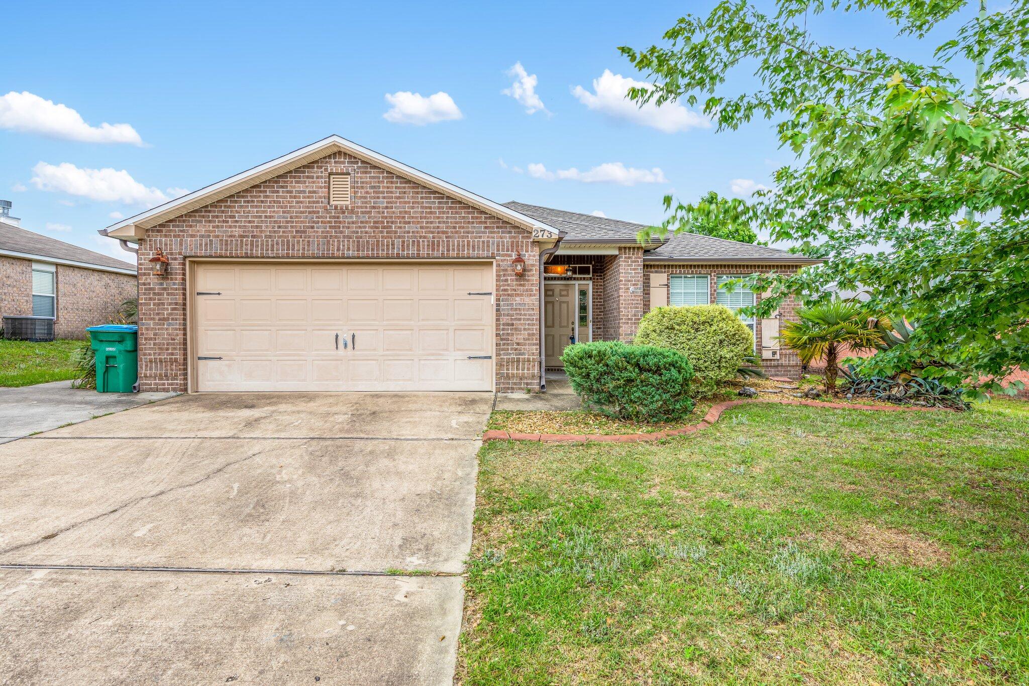 273 Limestone Circle Crestview, FL 32539 - Photo 1 of 36 a front view of house with yard
