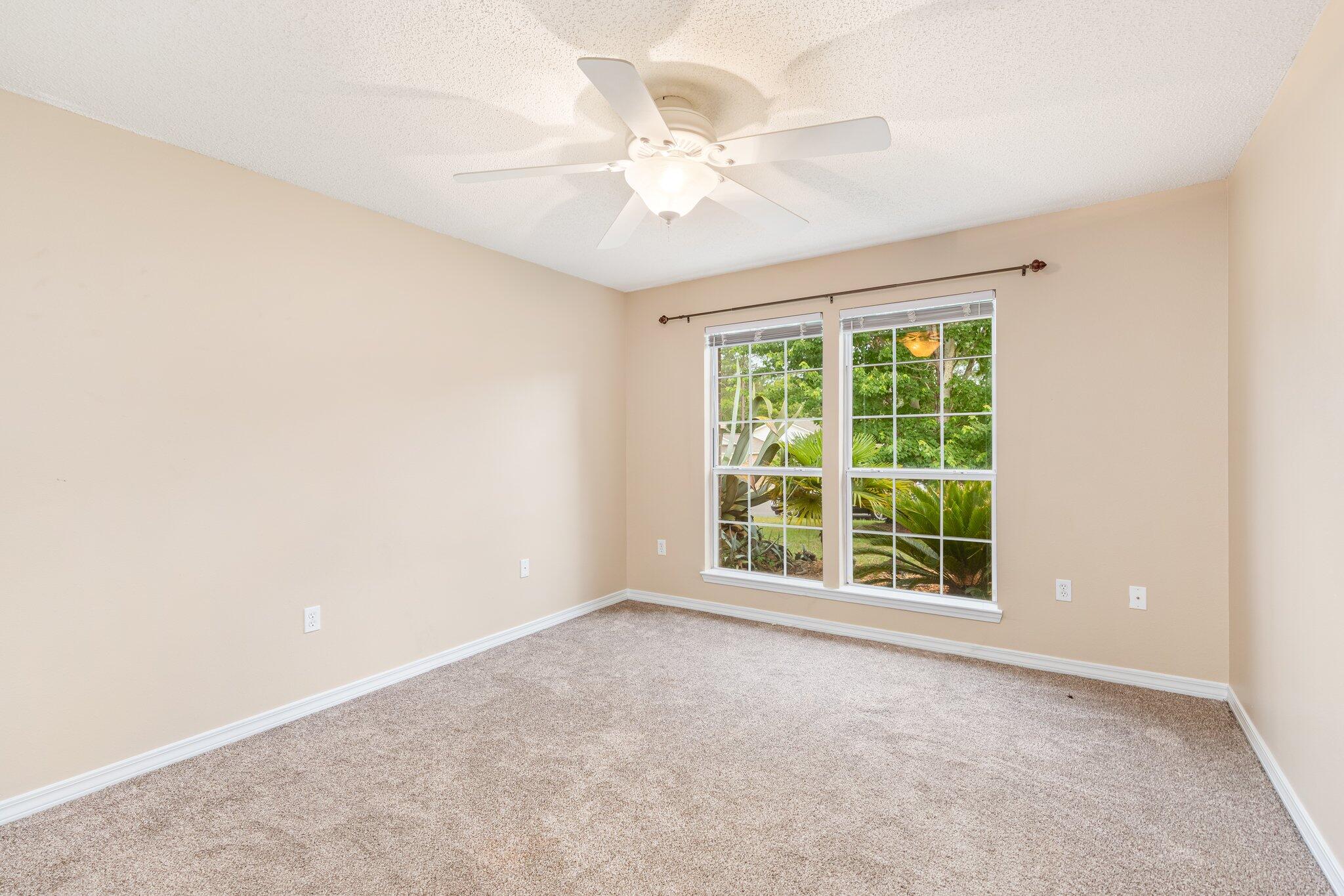 273 Limestone Circle Crestview, FL 32539 - Photo 27 of 36 an empty room with a window