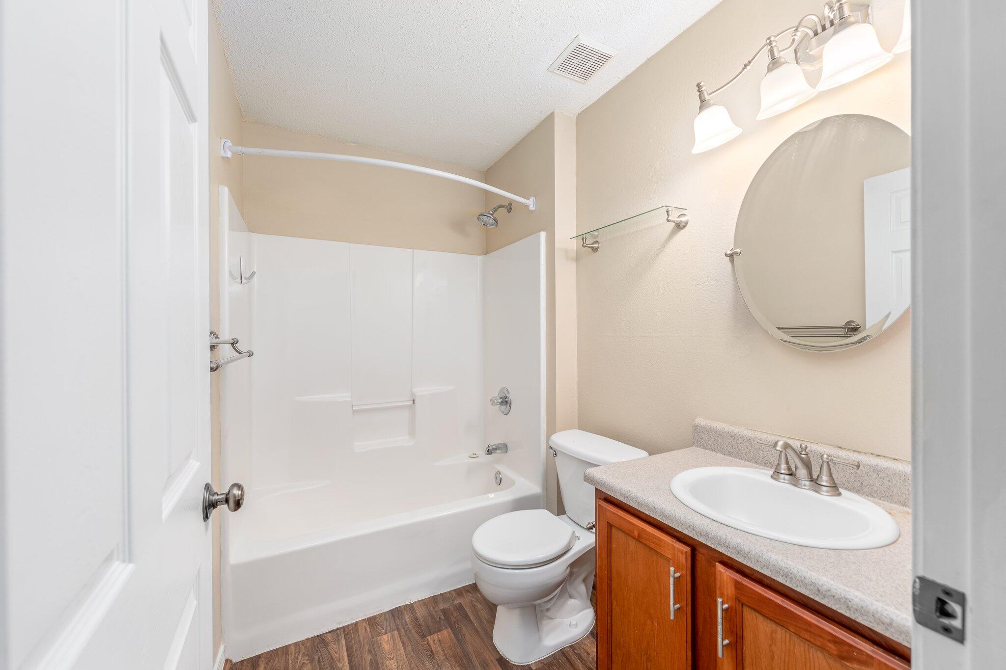 273 Limestone Circle Crestview, FL 32539 - Photo 28 of 36 a bathroom with a sink a toilet and shower