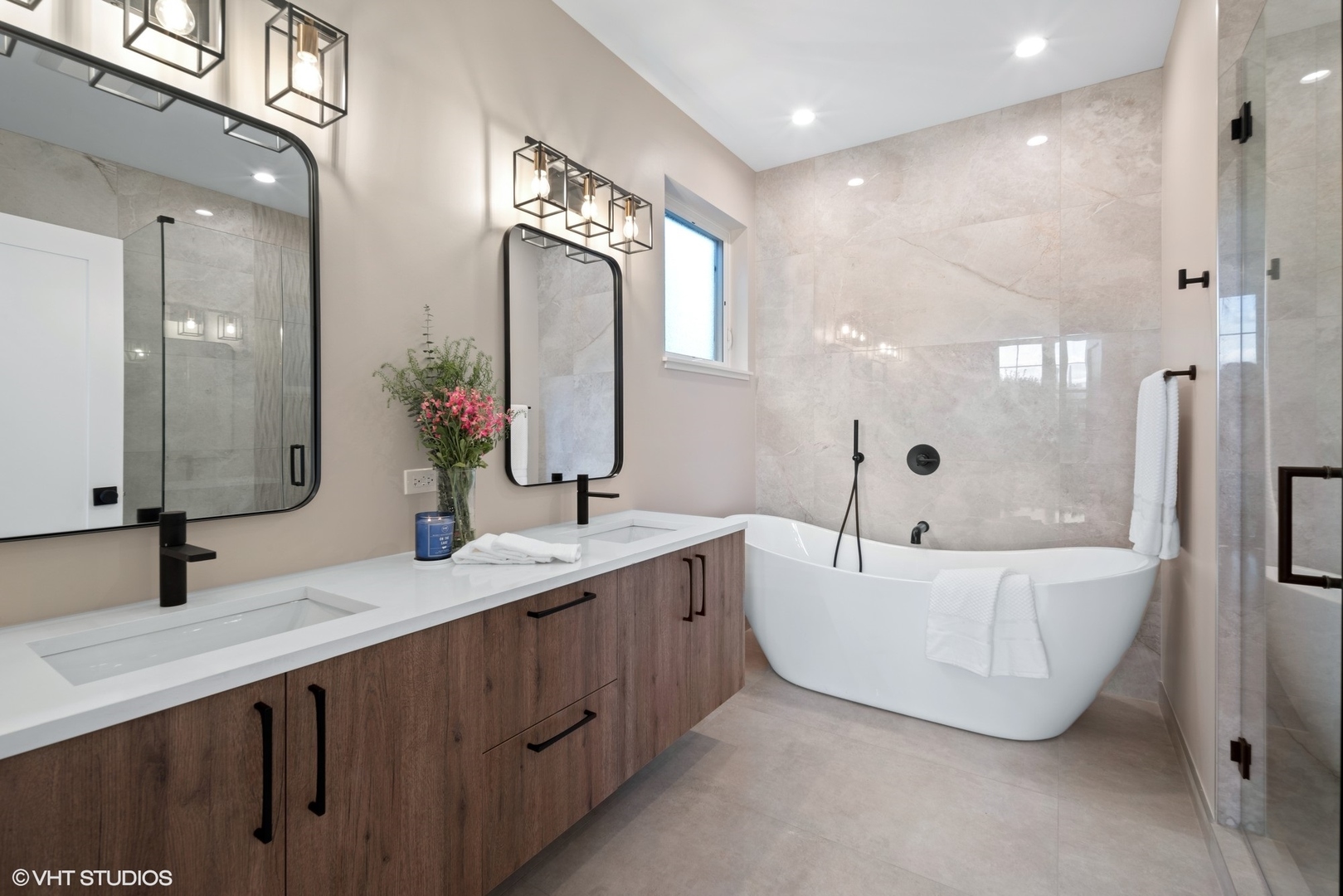 4448 South Drexel Boulevard, Unit A Chicago, IL 60653 - Photo 10 of 16 a bathroom with a double vanity sink mirror and bathtub