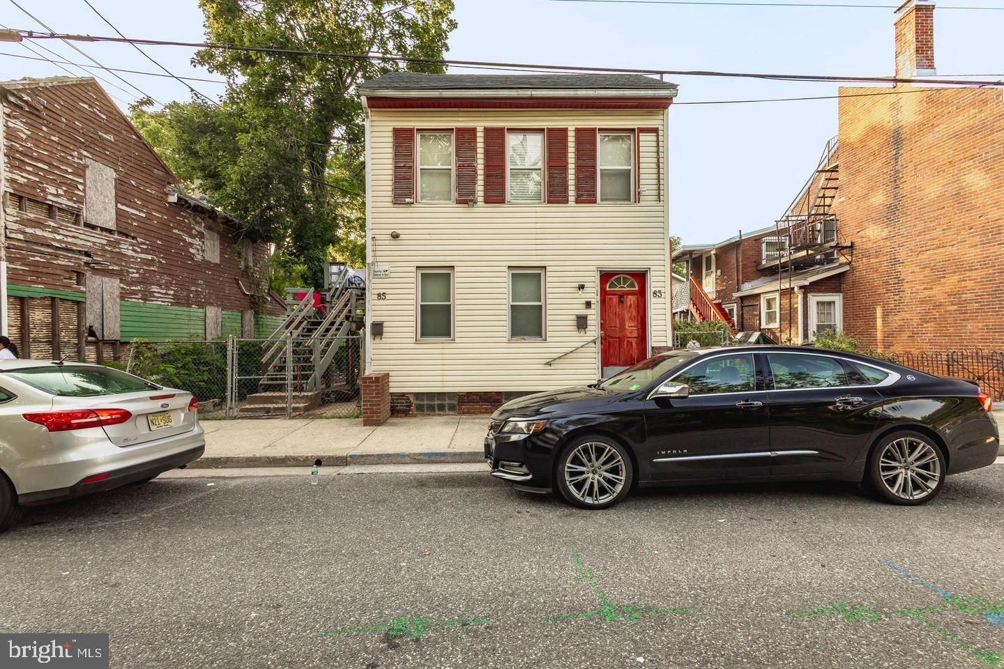 85 Union Street Salem, NJ 08079 - Photo 1 of 14 a car parked in front of a house