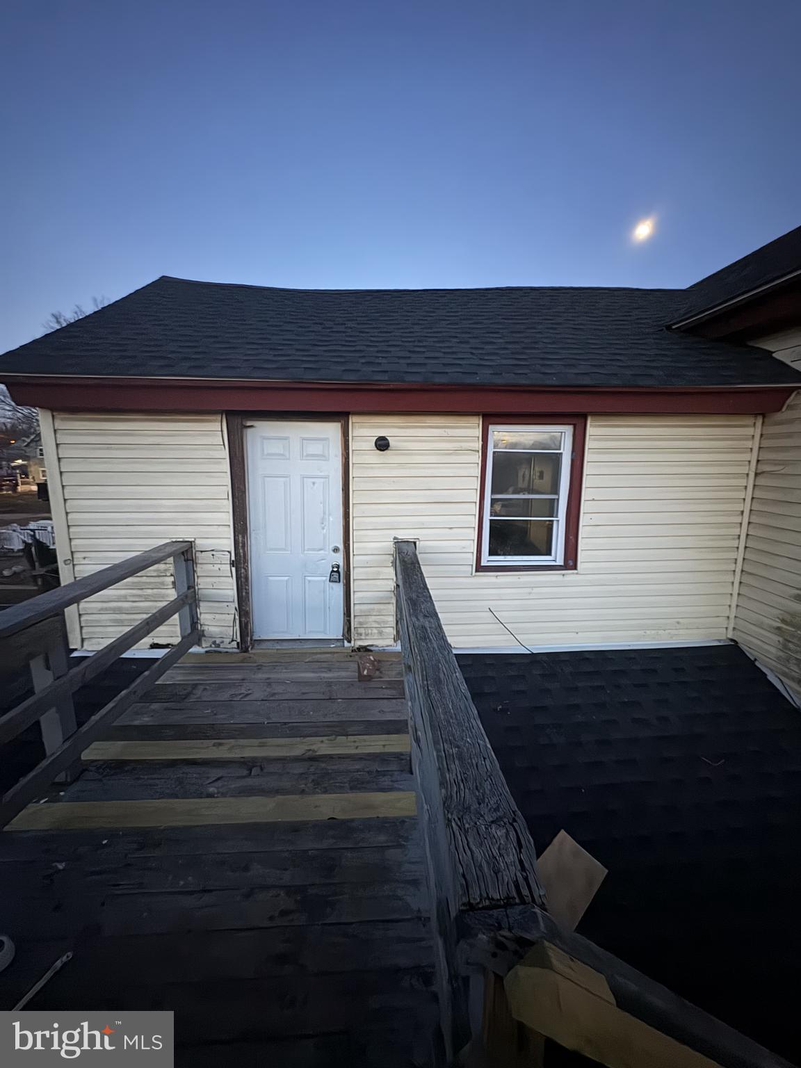 85 Union Street Salem, NJ 08079 - Photo 5 of 14 a view of a hallway with wooden floor and staircase