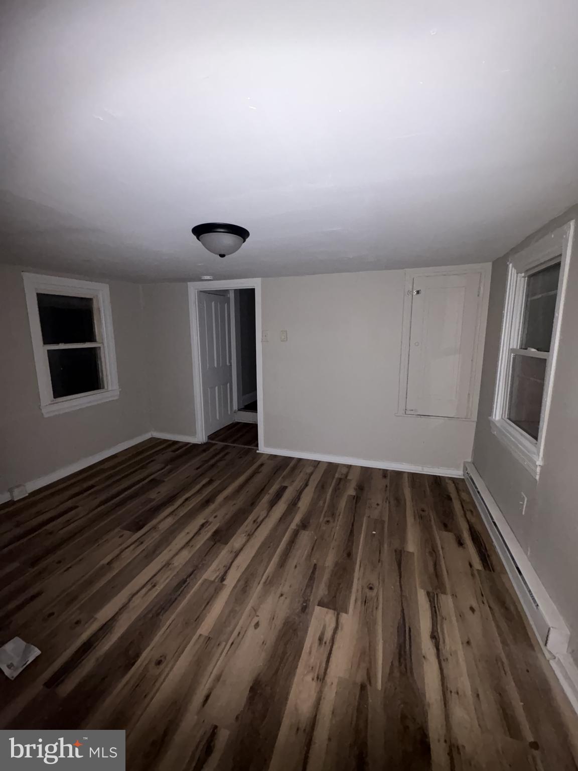 85 Union Street Salem, NJ 08079 - Photo 7 of 14 a view of empty room with wooden floor