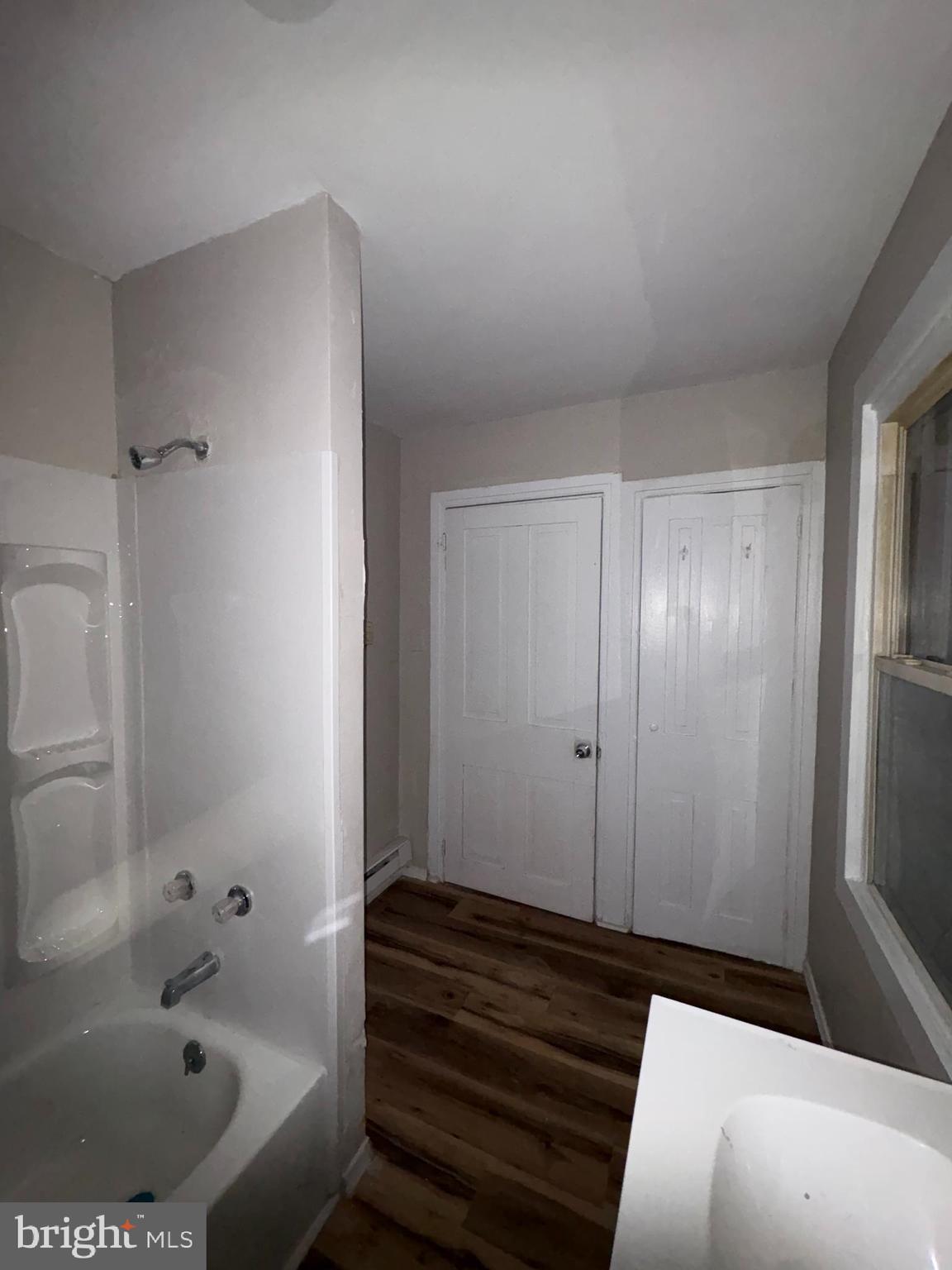 85 Union Street Salem, NJ 08079 - Photo 10 of 14 a bathroom with a bathtub and shower