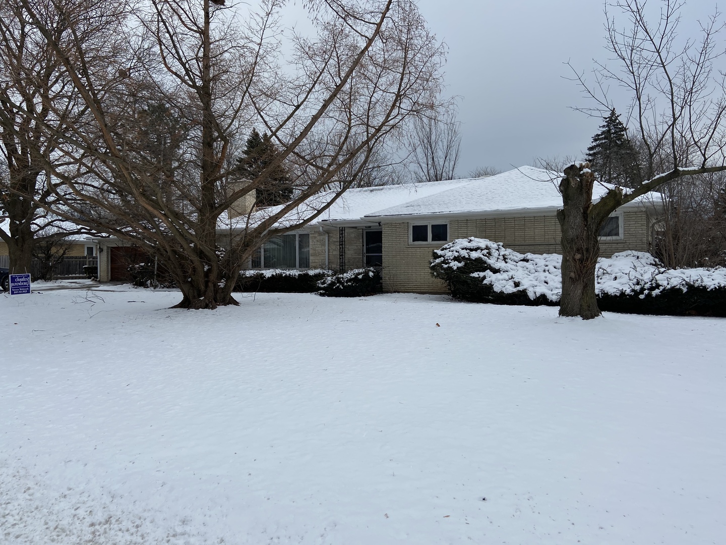 2249 Woodview Lane Park Ridge, IL 60068 - Photo 1 of 1 a view of street with a car parked in front of it