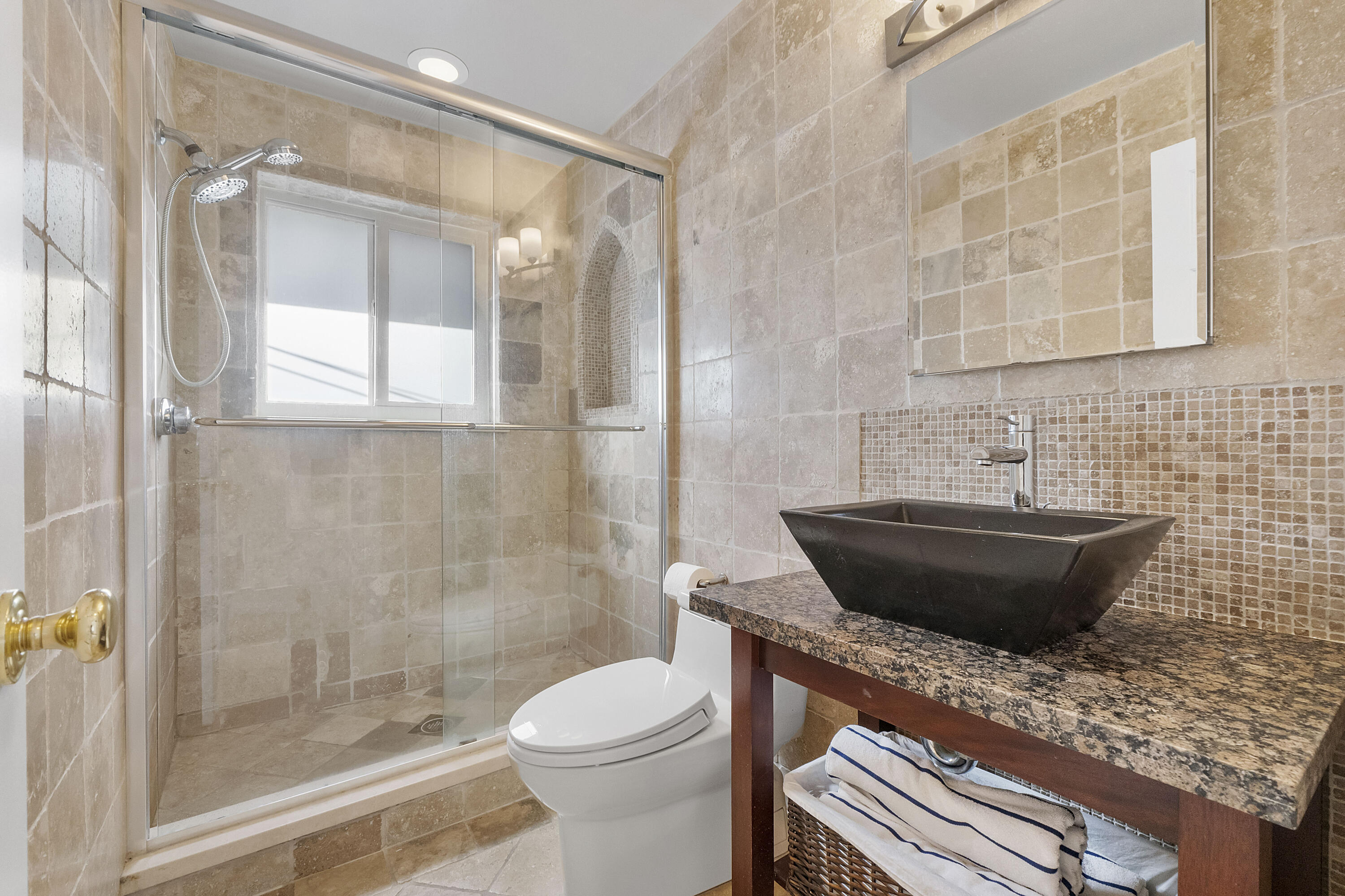 120 Southwest 8th Avenue Boca Raton, FL 33486 - Photo 18 of 38 a bathroom with a granite countertop sink toilet and shower