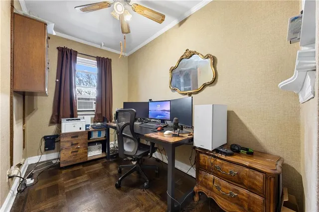 a workspace with furniture and a window