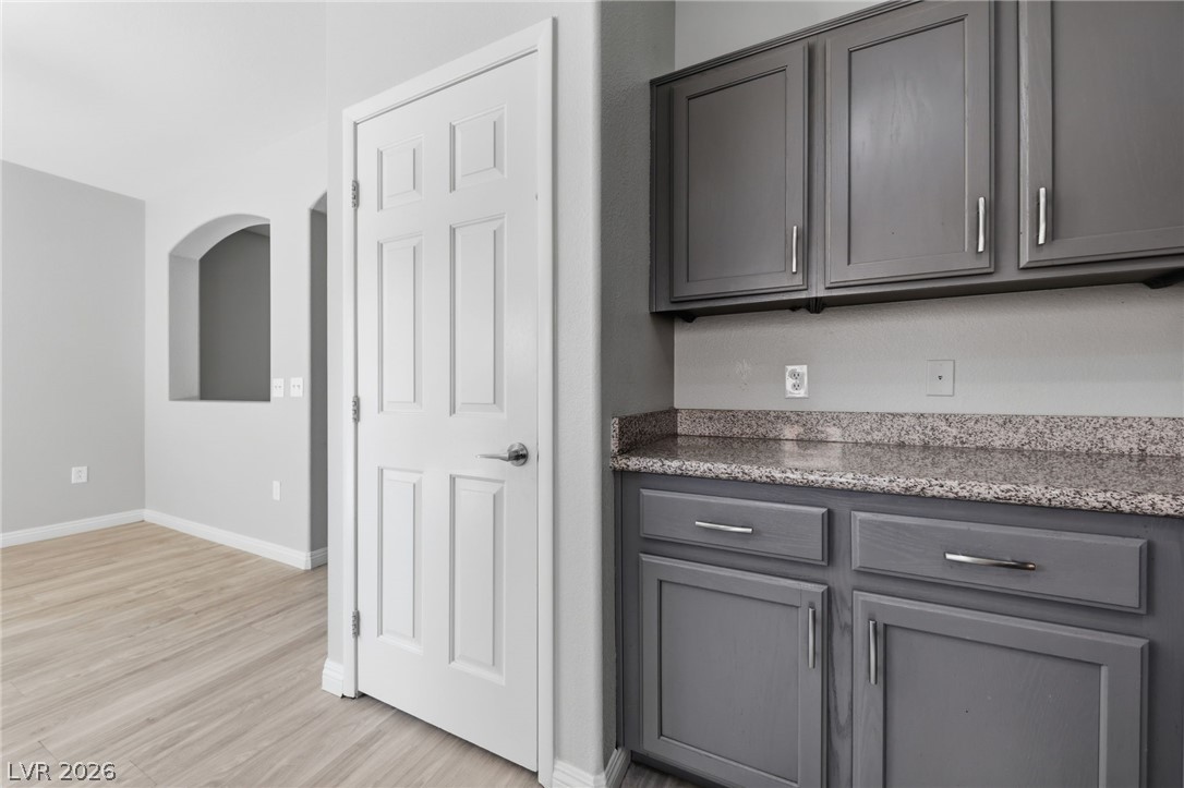 6312 Sandy Ridge Street, Unit 3102 North Las Vegas, NV 89081 - Photo 9 of 31 Functional kitchen prep area includes generous countertop space and sleek cabinetry.